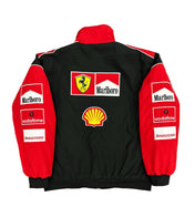 Black and red jacket with various logos on a textured gray background