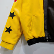 Yellow jacket with black stars on a white background