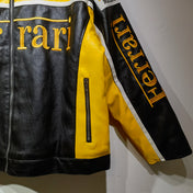 Black and yellow jacket with 'Herrll' branding on a white background