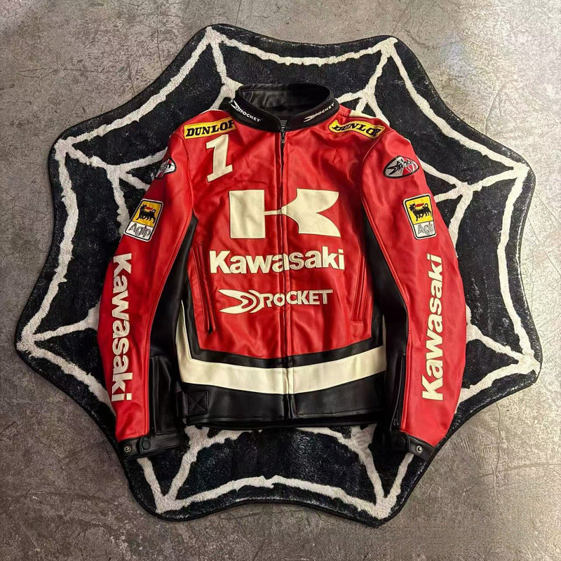 Red Kawasaki motorcycle jacket on a textured surface