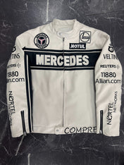 White leather jacket with Mercedes and Motul branding on a dark textured background