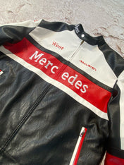 Black leather jacket with red and white accents featuring Mercedes branding.